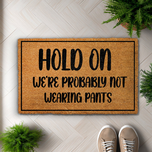 Quirky Welcome: No Pants Doormat for Relaxed Home Vibes